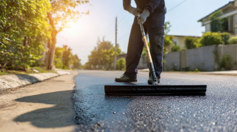 Applying Asphalt Sealant